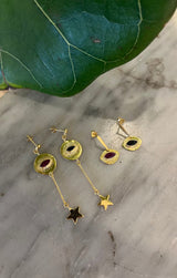 Nafsu - Long Gold plated eye earstick w/star pendant I Red ruby