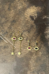 Nafsu - Gold plated earstick w/eye pendant I Red Ruby