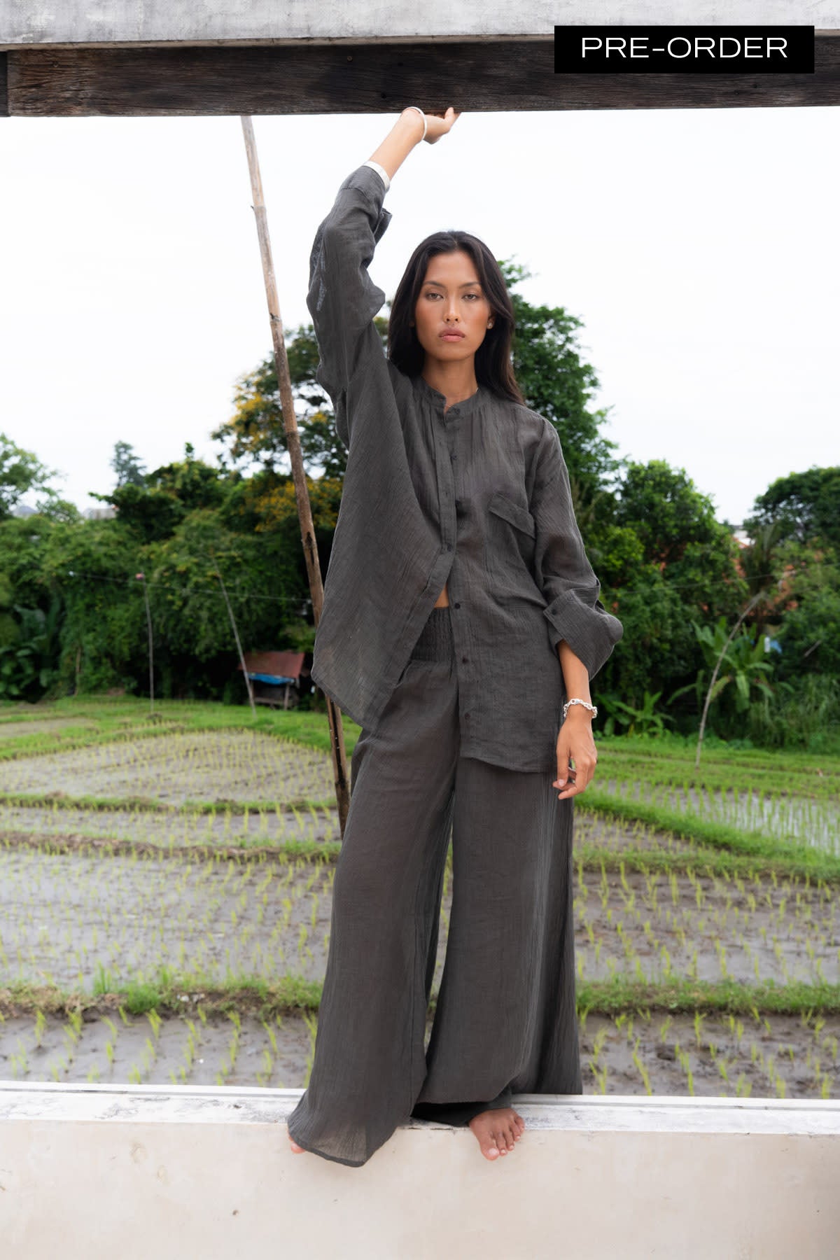 Karam - PRE-ORDER I Crinkled wide leg pants I Faded black